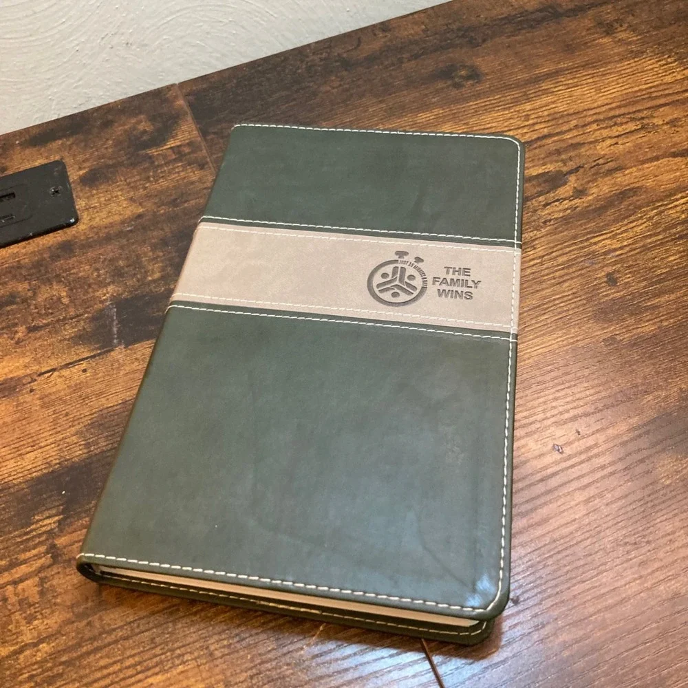The Family Wins NIV New Testament Devotional LeatherLike Cypress Dune Bible 2020